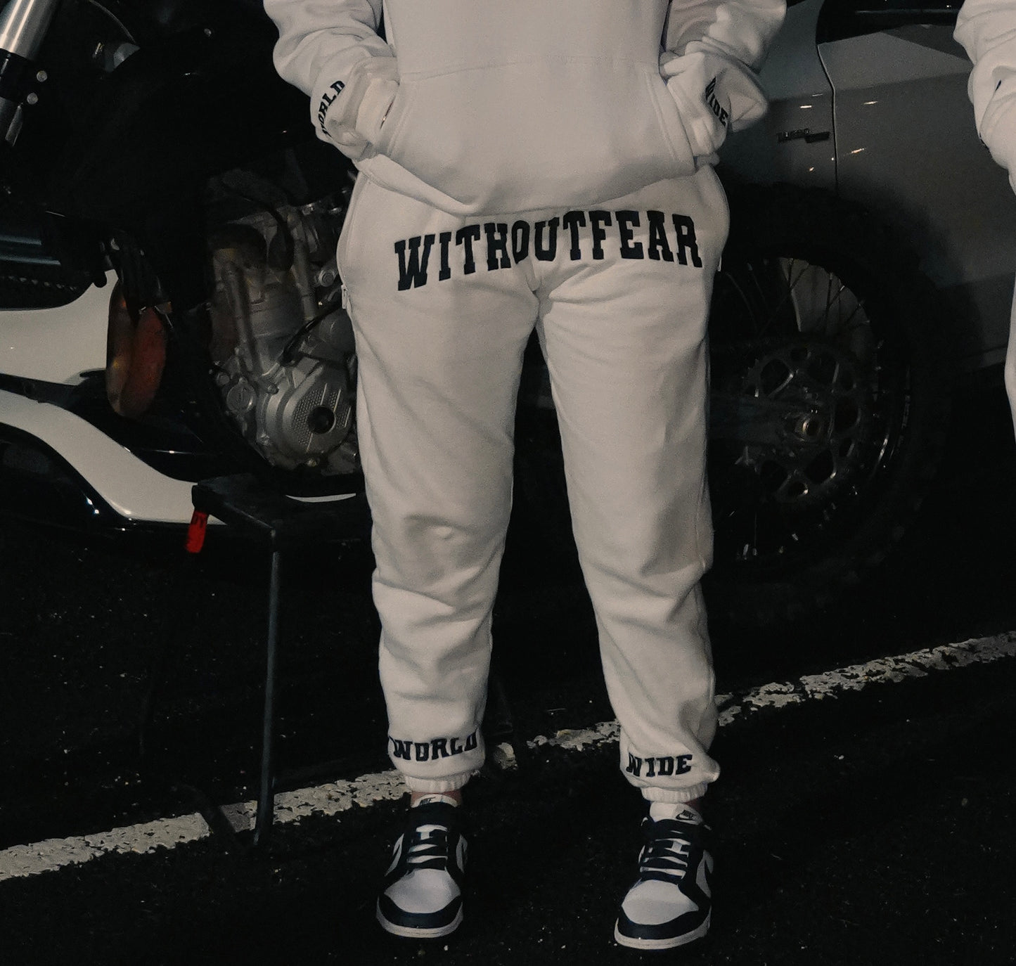 WHITE WORLDWIDE TRACKSUIT PANTS